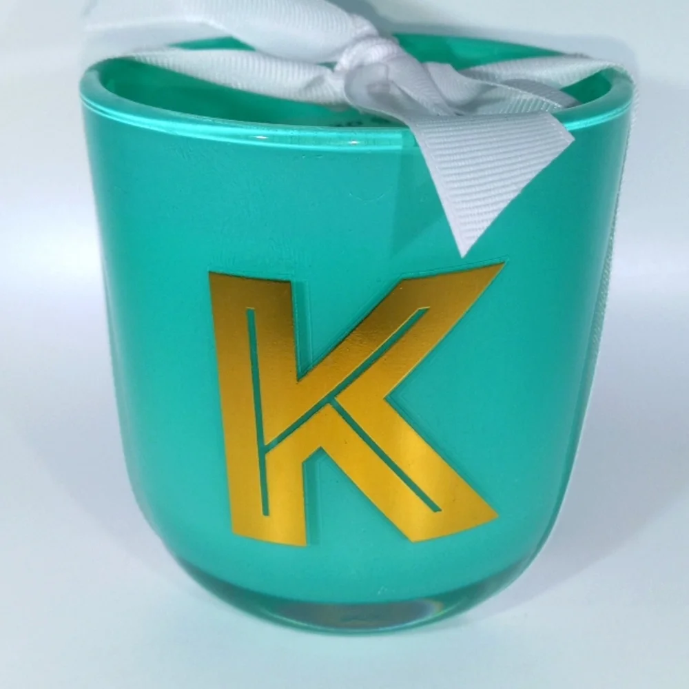 CANDLE WITH GOLD K INITIAL